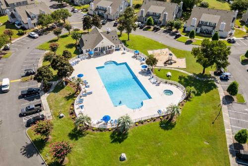 an overhead view of a swimming pool at a resort at Fairway Oaks Unit 57B in Myrtle Beach