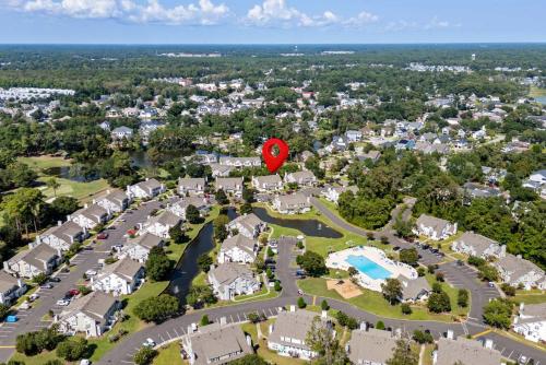 an aerial view of a residential neighborhood with a red heart on top at Fairway Oaks Unit 57B in Myrtle Beach