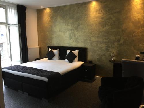 Postel nebo postele na pokoji v ubytování Sara's Boutique Hotel