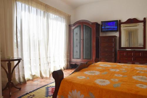 Postel nebo postele na pokoji v ubytování Sandorini Villa for Rent