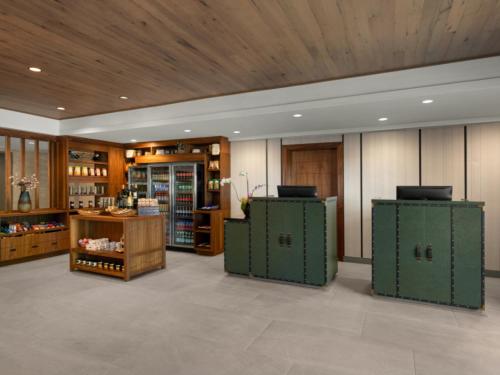 a store with two green chests in a room at Napa Winery Inn in Napa