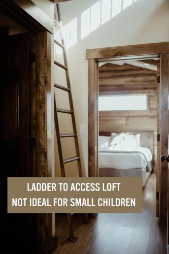 a ladder to access loft not ideal for small children at Teton Valley Resort in Victor