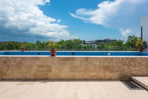 Hồ bơi trong/gần Amira Residence Confortable 1 BR in Aldea Zama