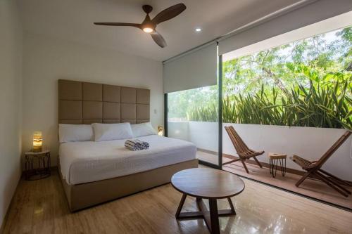 Giường trong phòng chung tại Amira Residence Confortable 1 BR in Aldea Zama