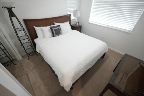 Ένα ή περισσότερα κρεβάτια σε δωμάτιο στο Paradise Ohana Ocean View Oasis with community Pool, Spa, Gym and Rec Area with PingPong, Air Hockey and Foosball