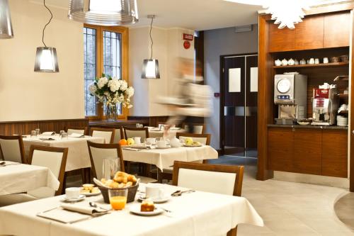 Restoranas ar kita vieta pavalgyti apgyvendinimo įstaigoje Hotel Garni Cristallo