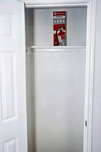 a door of a refrigerator with a box in it at Spacious 4-bedroom house with AC, Wi-Fi superb in the Heart of Arlington, TX! in Johnsons Station