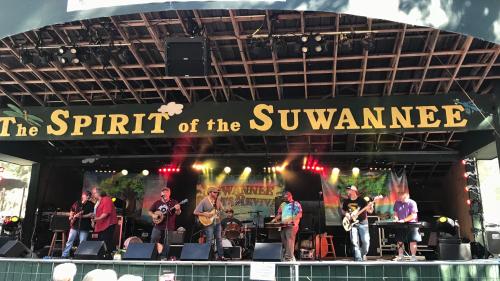 a group of people on a stage at a concert at Holiday Inn Express Hotel & Suites Live Oak by IHG in Live Oak