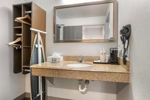 a bathroom with a sink and a mirror at Best Western Montgomery I-85 North in Montgomery