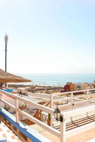 a view of the beach from the roof of a building at Surf Break Morocco in Imsouane