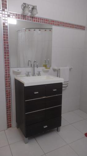 a bathroom with a sink and a toilet at Casa Felisa in San Salvador de Jujuy