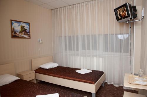 En eller flere senge i et værelse på Eurohotel