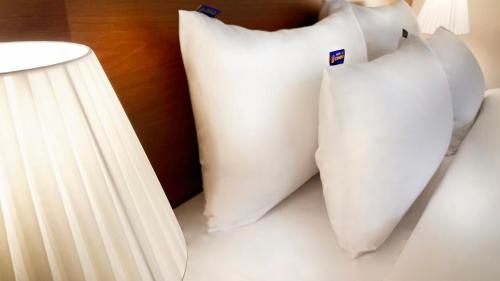 Кровать или кровати в номере Hostel the Camino Seoul