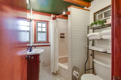 a bathroom with a toilet and a sink and a shower at Idyllic Home in Kernville with Private Beach Access in Kernville