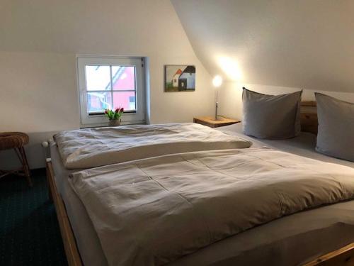 Cama o camas de una habitación en Casparhus
