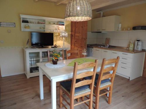 Kuchyň nebo kuchyňský kout v ubytování Ferienhaus Woge