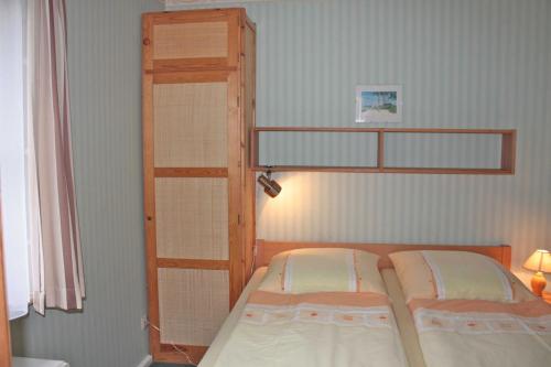 Postel nebo postele na pokoji v ubytování Ferienhaus Woge