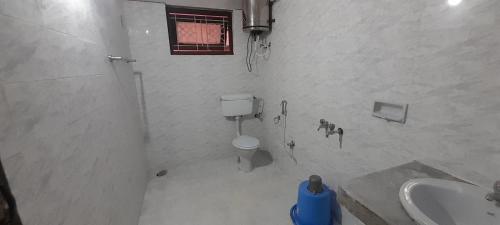 Koupelna v ubytování Janani Cottage