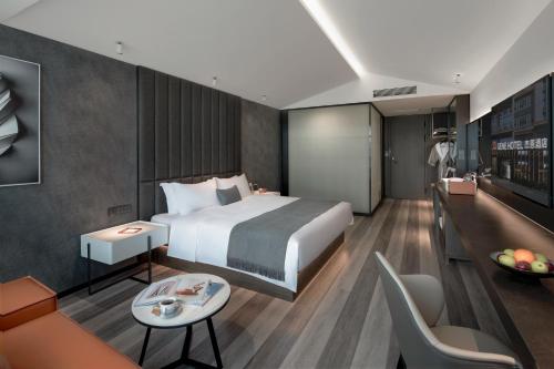 Postel nebo postele na pokoji v ubytování Gene Hotel -Chengdu Shuangliu Airport