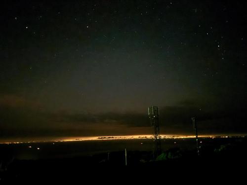 a view of the night sky with the stars at 大島温泉ホテル in Oshima