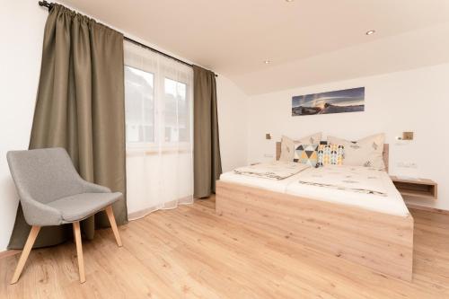 Posteľ alebo postele v izbe v ubytovaní Bergnest Oetztal Appartements Wenderkogel