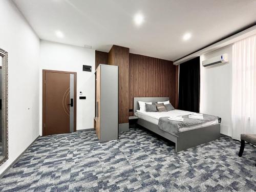 Postel nebo postele na pokoji v ubytování Residence Inn Orijent