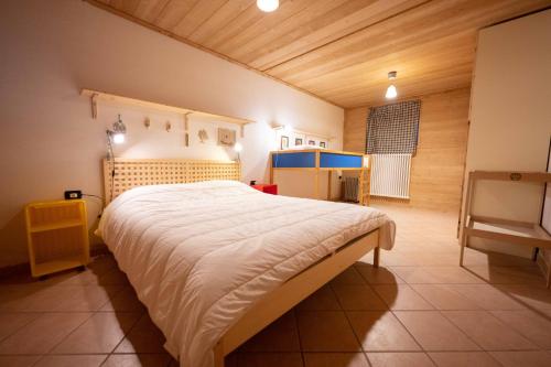 A bed or beds in a room at Cesa Pecedel