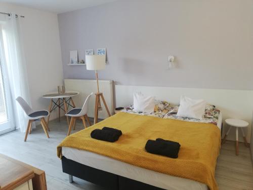 Ένα ή περισσότερα κρεβάτια σε δωμάτιο στο SKALNY apartamenty, pokoje