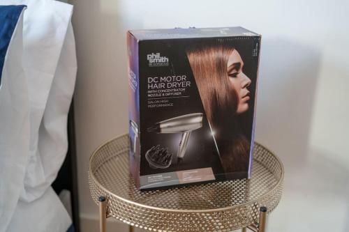 a box of brown hair dye sitting on a table at New 4BD Stylish Apartment with Amazing Transport in London