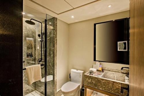 Ένα μπάνιο στο MUSTEL Hotel of Beijing Mentougou