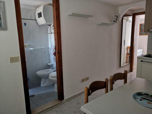 Ein Badezimmer in der Unterkunft Turistcasa - Il Corridoio 34