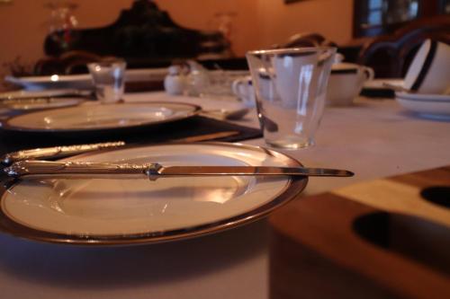 Restaurace v ubytování Mossvale Lodge Country House Bed and Breakfast