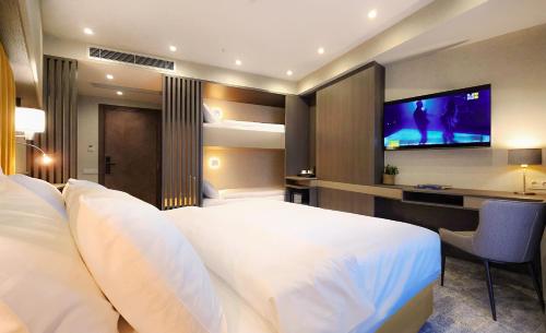TV a/nebo společenská místnost v ubytování Griffin Hotel