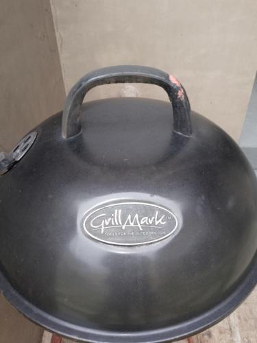 a black kettlebell sitting on top of a table at Cristina's Holiday Home in Tagaytay