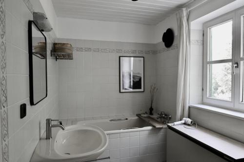 Ένα μπάνιο στο Ferienhaus Flying Roots Wackersberg