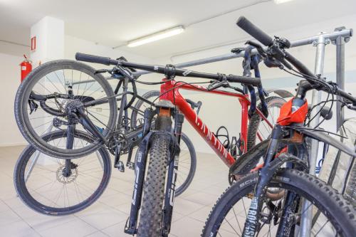 a group of bikes parked next to each other at Club Hotel e Residence La Vela in Nago-Torbole