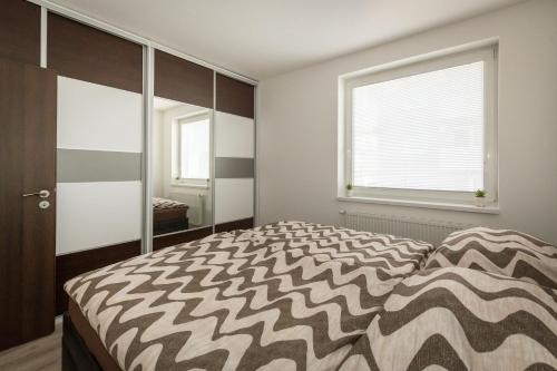 Postel nebo postele na pokoji v ubytování 3 rooms Luxury apartment with private parking