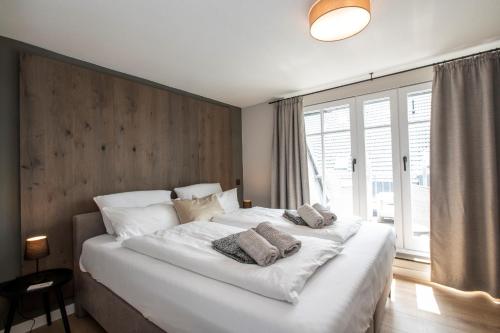 Ένα ή περισσότερα κρεβάτια σε δωμάτιο στο Ferienhaus Seeschwalbe 12 2