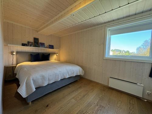 Ένα ή περισσότερα κρεβάτια σε δωμάτιο στο Modern apartment in the heart of Geilo center