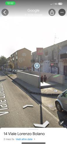 a street with a car parked on the side of the road at DATO House in Catania