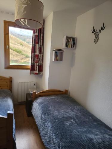 Llit o llits en una habitació de Edelweiss17