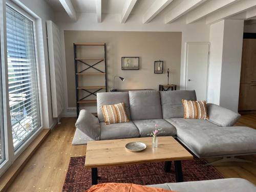 Χώρος καθιστικού στο Ferienwohnung Strohbär in Leißling