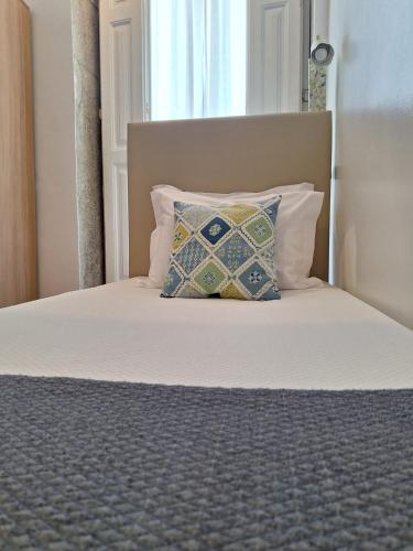 Ένα ή περισσότερα κρεβάτια σε δωμάτιο στο Dear Porto Guest House