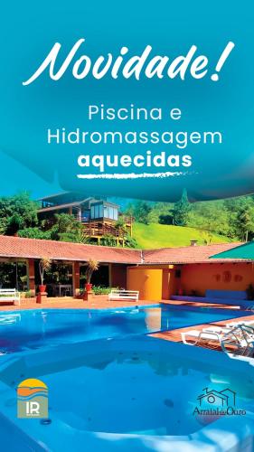 a brochure of a resort with a swimming pool at Pousada Arraial do Ouro in Gaspar