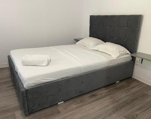 Postel nebo postele na pokoji v ubytování Green Residence Brasov