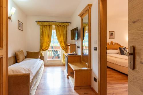 Monza Dolomites Hotelにあるベッド