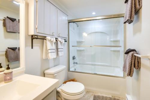 a bathroom with a toilet and a glass shower at North Conway Vacation Rental Near Saco River! in North Conway