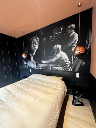 Ένα ή περισσότερα κρεβάτια σε δωμάτιο στο KLOOZIA Suites centre ville haut standing
