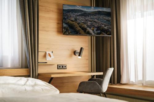 Ein Bett oder Betten in einem Zimmer der Unterkunft Hotel Linde - 24h Self Check-in