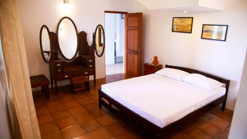 Postel nebo postele na pokoji v ubytování Breez Holiday Home